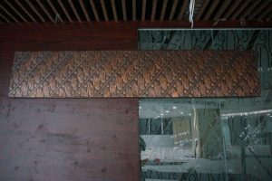 Ornamen dinding tembaga